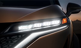 2023 Nissan Ariya close up of LED headlights